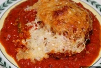 Crispy Mozzarella Topped Fried Green Tomatoes with Savory Marinara