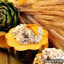 Close up of Cheesy Asiago Artichoke & Spinach Dip