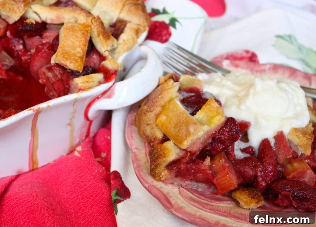 slice of strawberry rhubarb mascarpone pie