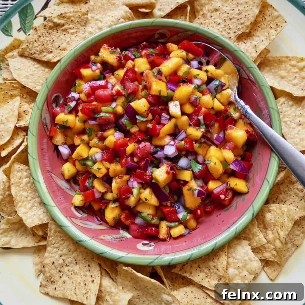 Juicy peach salsa in a glass bowl