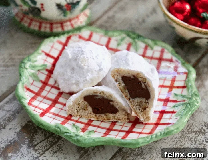 Nutella Stuffed Snowball Cookies with Powdered Sugar