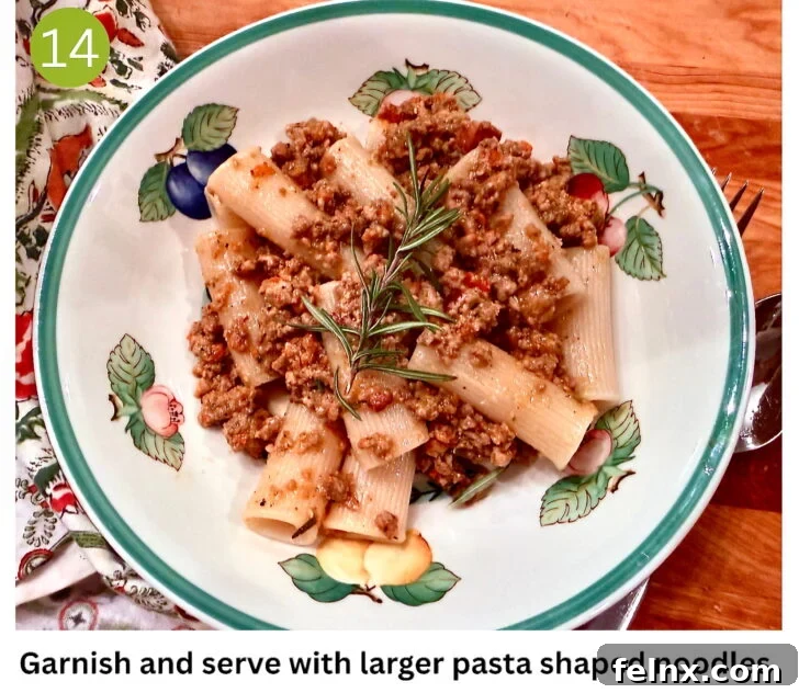Plated white bolognese with parmigiano