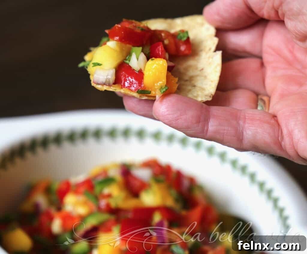 Mango Pineapple Salsa served as an appetizer with chips