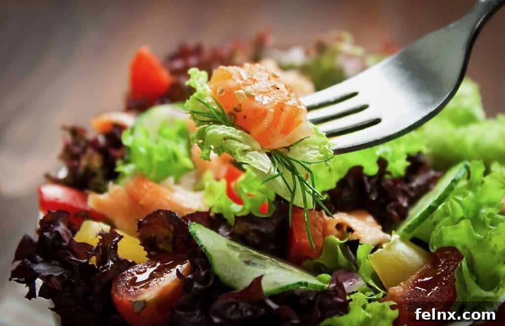 varieties of salad ingredients on a wooden board