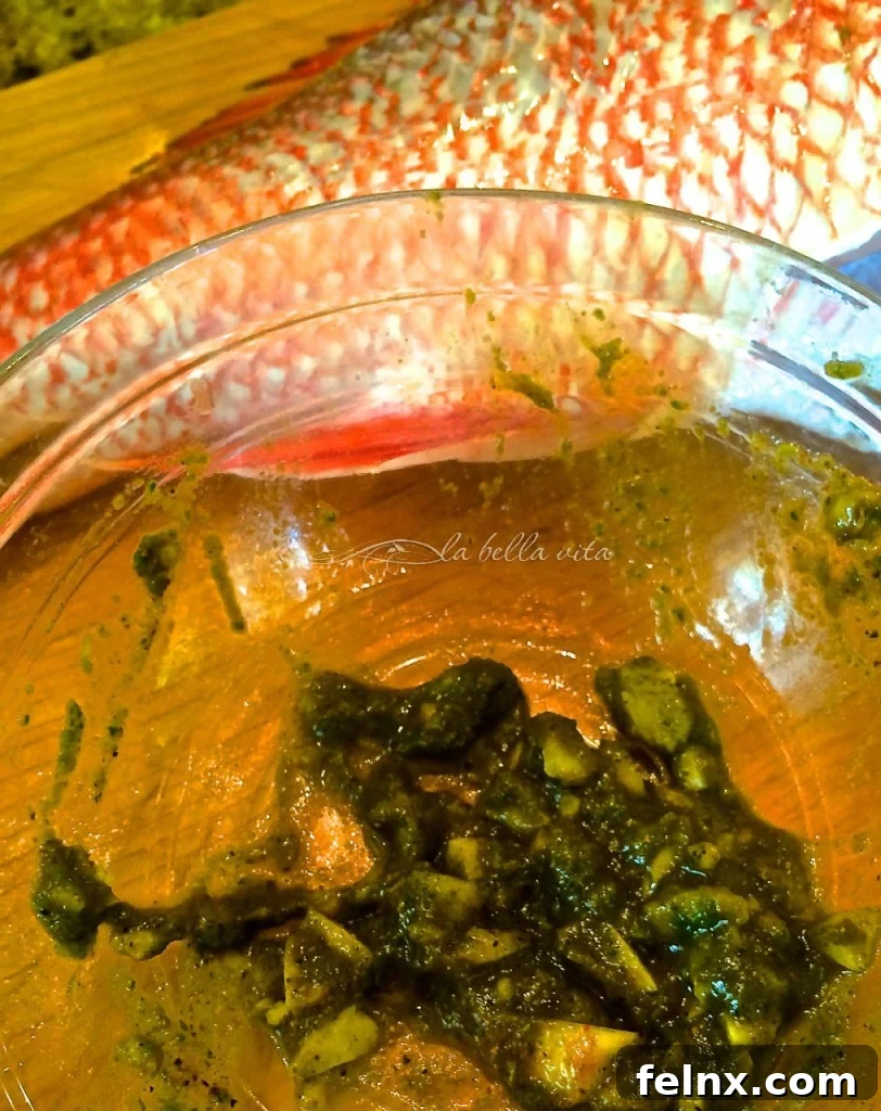 Applying Green Seasoning to Fish