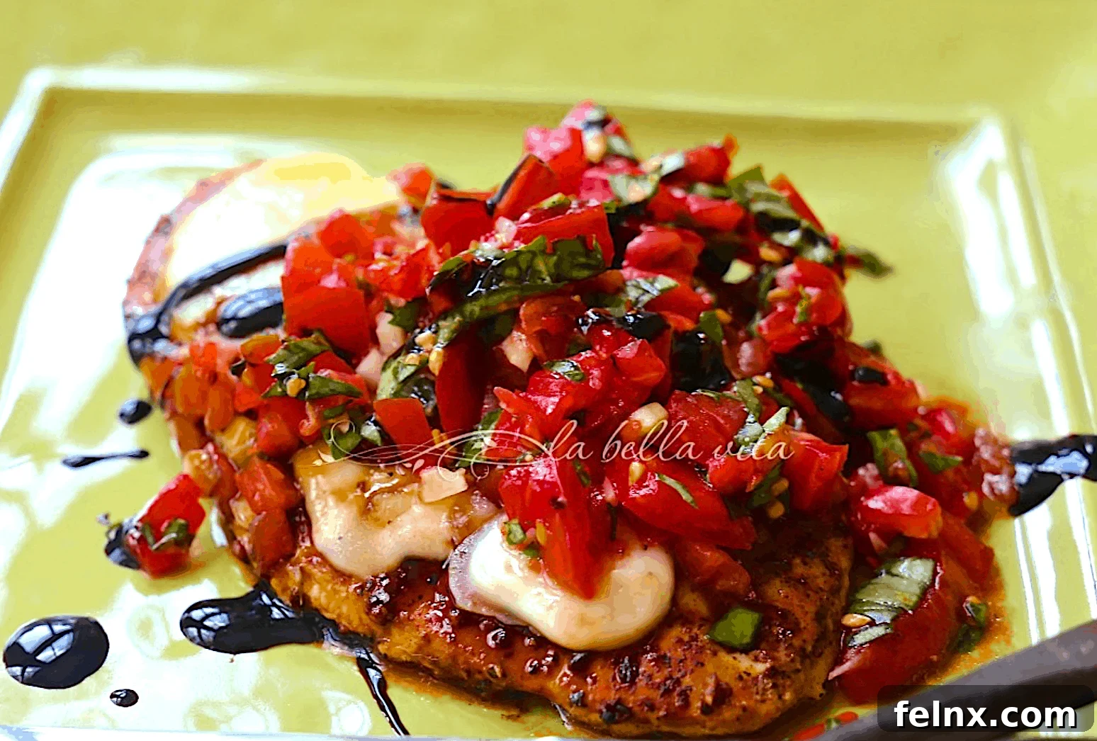 Delicious Italian Bruschetta Chicken topped with fresh tomatoes and basil