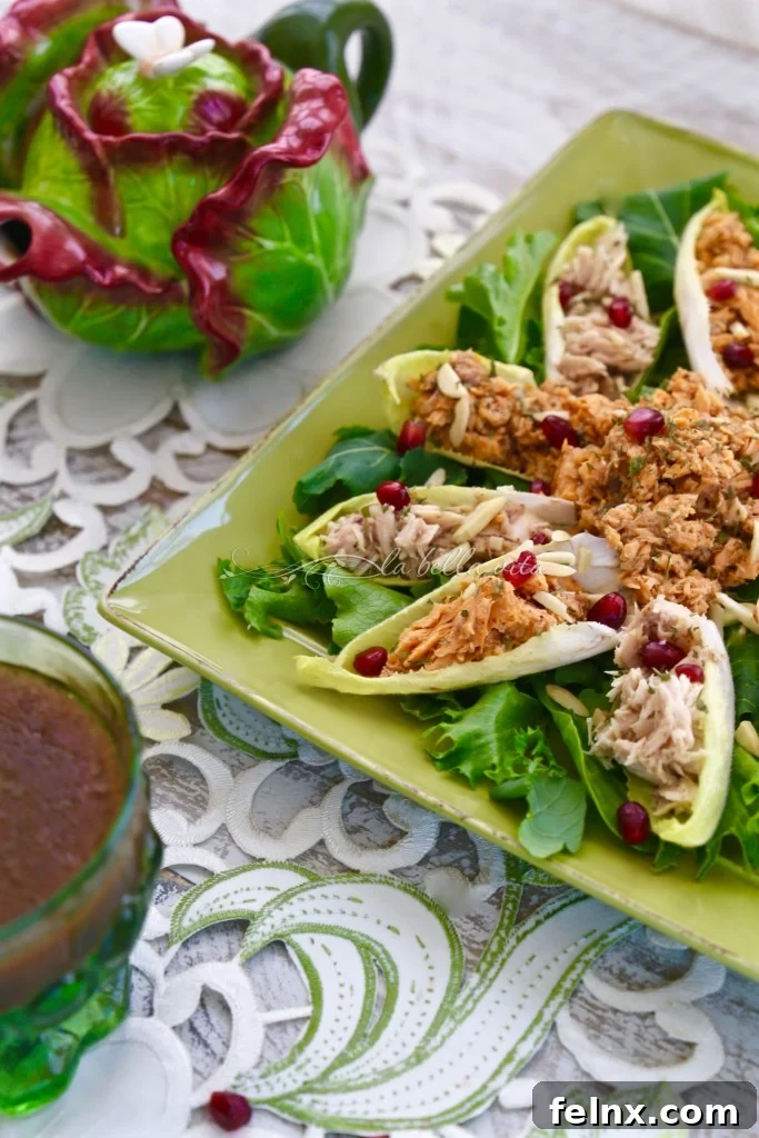 Close up of Salmon and Tuna Endive Bites