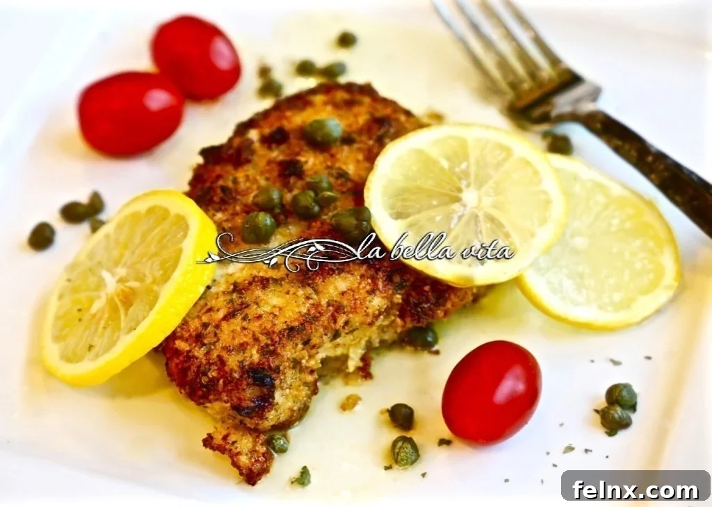 Italian Breaded Pork Chop Scallopini on a white plate
