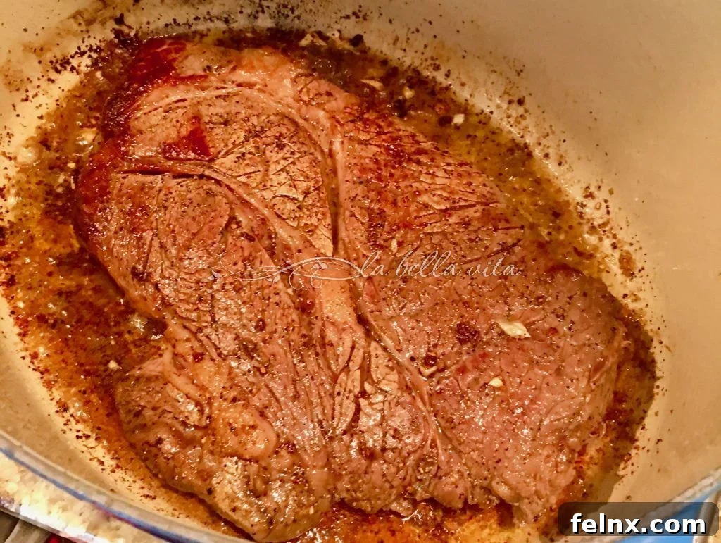 Searing the beef in a Dutch oven
