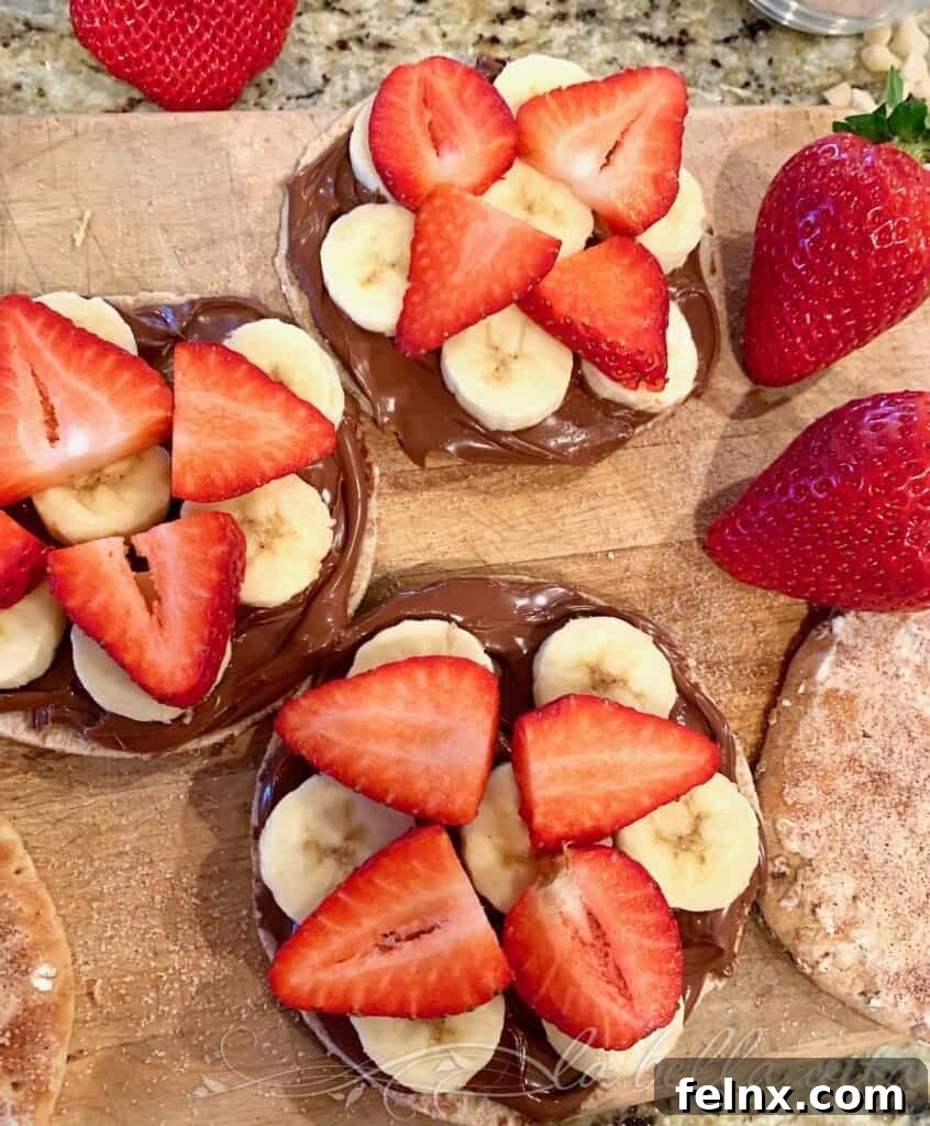 Adding strawberry slices