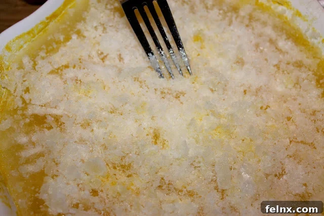 Scraping the granita with a fork