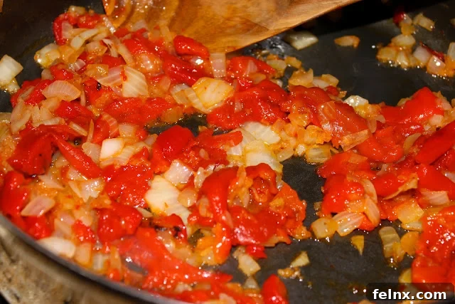Sautéing onions and garlic for the sauce