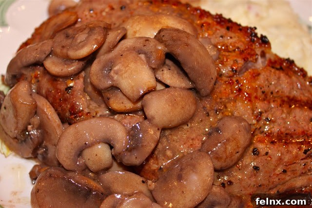 Close up of steak with mushroom gravy