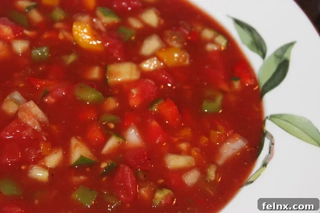 Fresh homemade gazpacho in a glass bowl