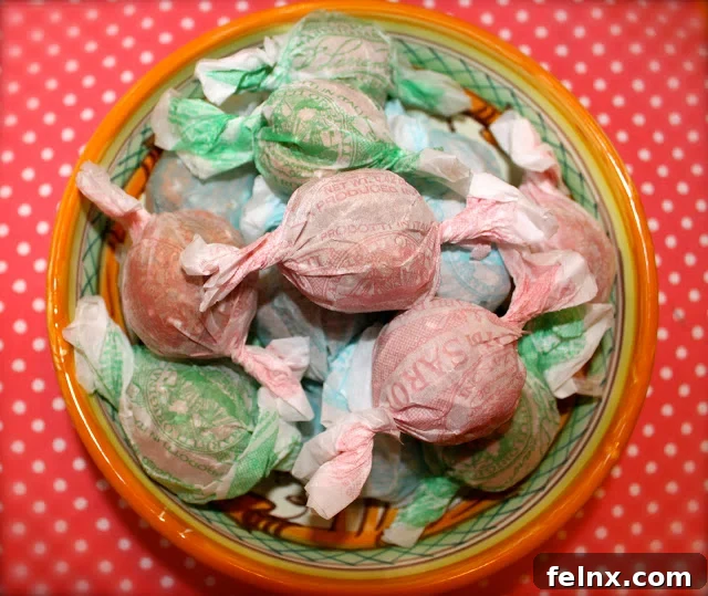 Individually wrapped Amaretti cookies in colorful tissue paper