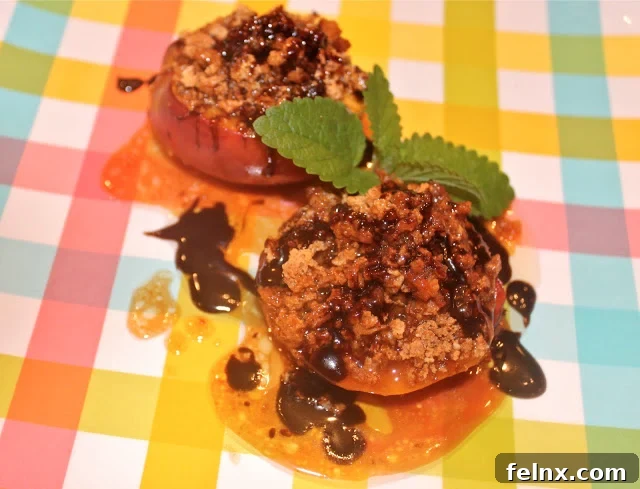 Final broiled peaches with melted butter and chocolate drizzle