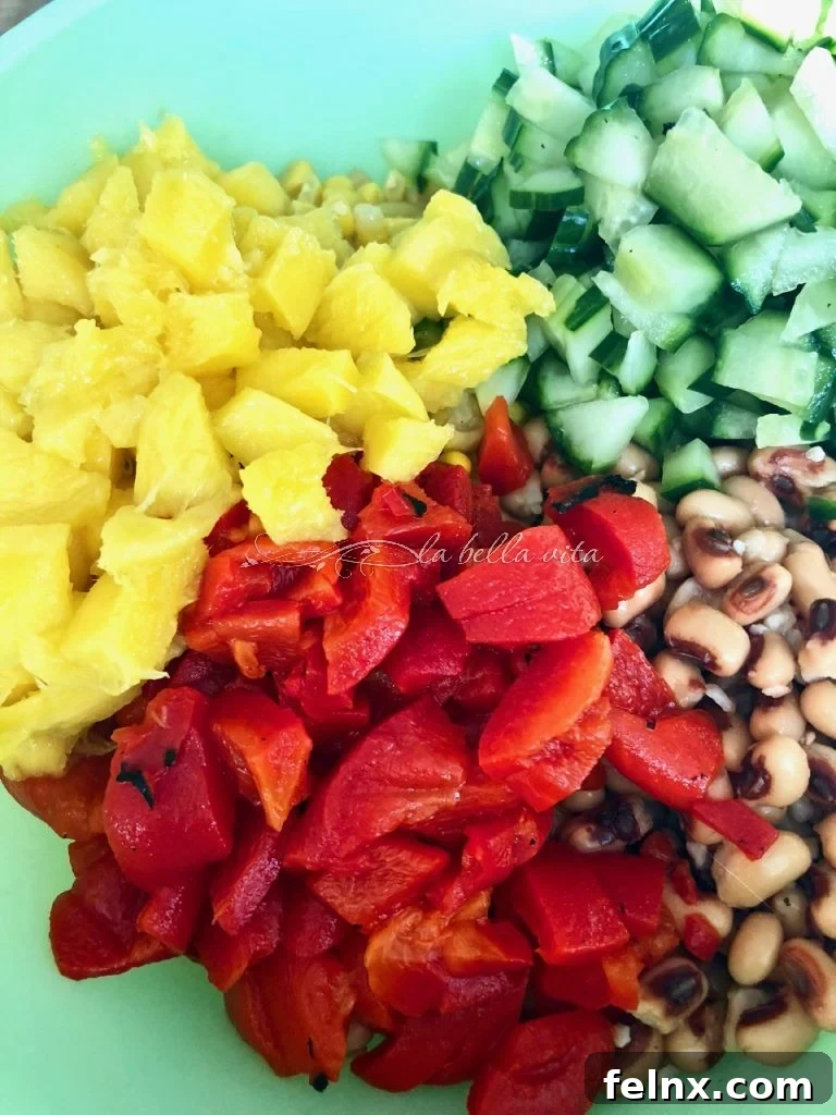 Zesty Sweet Corn and Black Eyed Pea Medley 7 Adding chopped mango