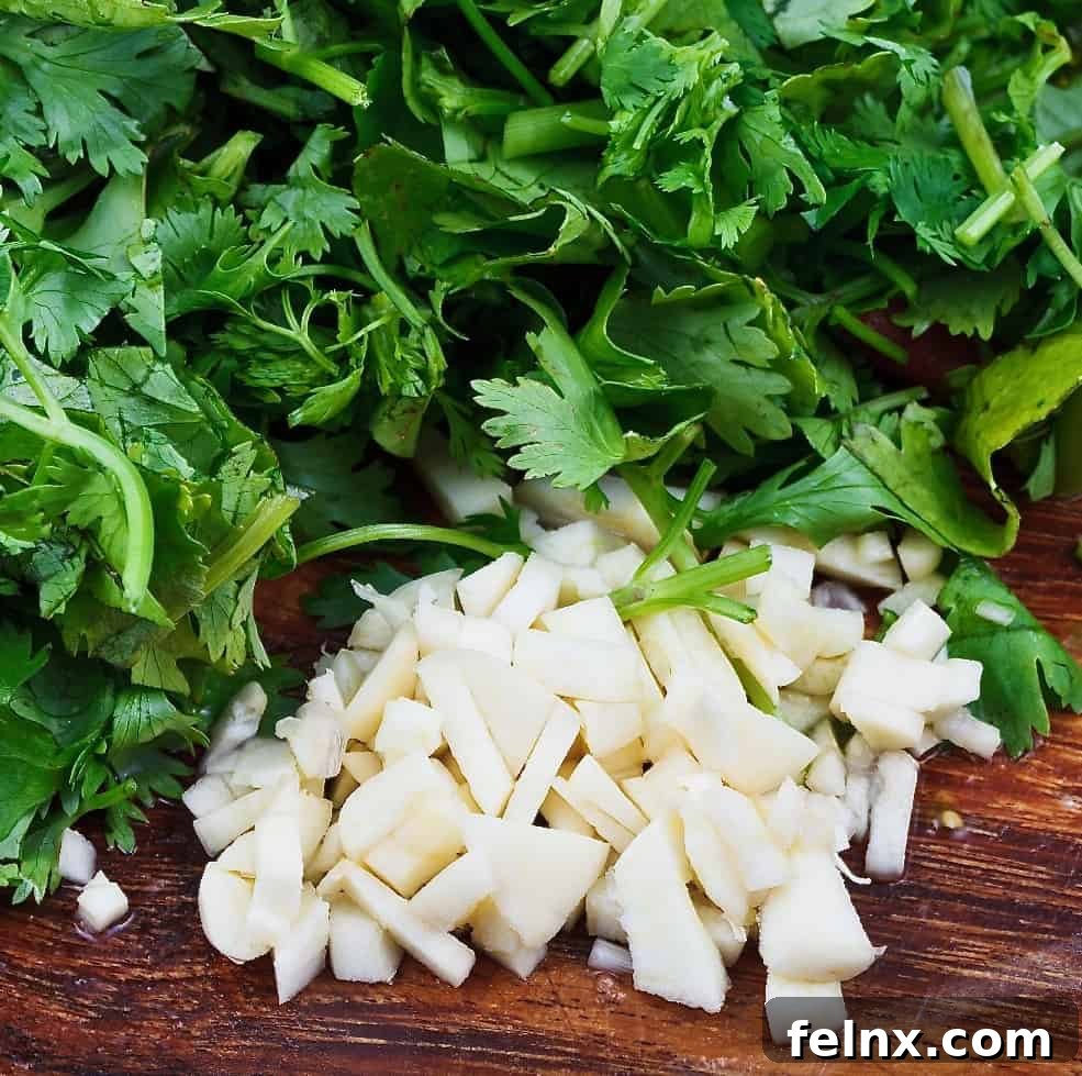 Mincing fresh garlic and cilantro