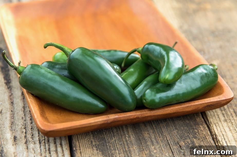 Adding diced jalapeños for heat
