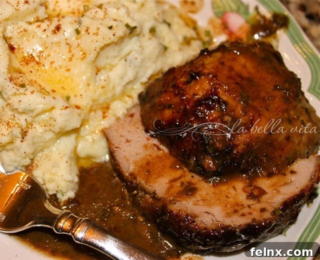 Roasted Pork Tenderloin plated with sauce