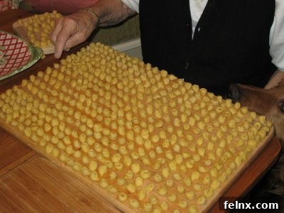 A large batch of handmade tortellini ready for cooking