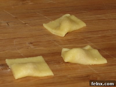 Unfolded tortellini pieces ready for final shaping