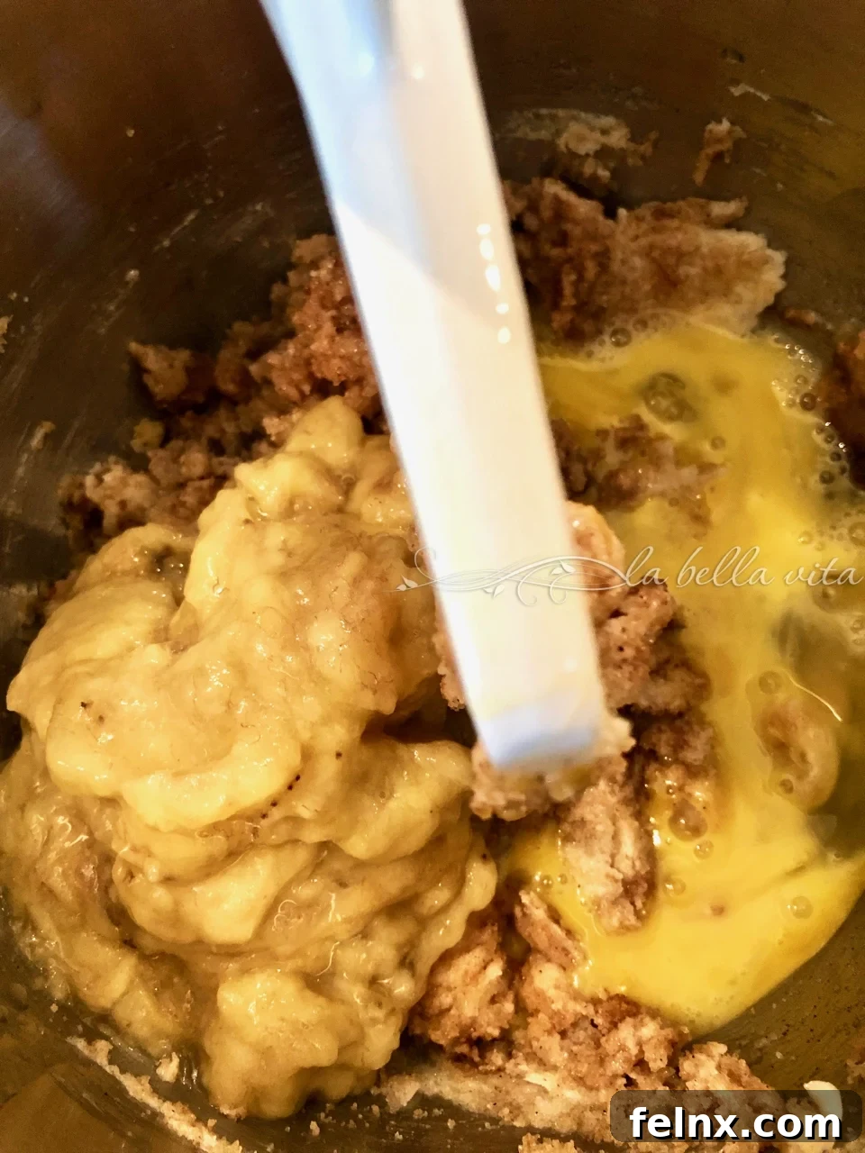 Adding wet ingredients to the batter