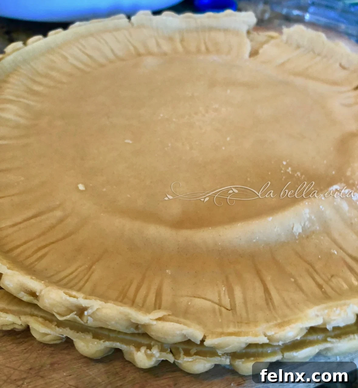 Rolling out two pie crusts together