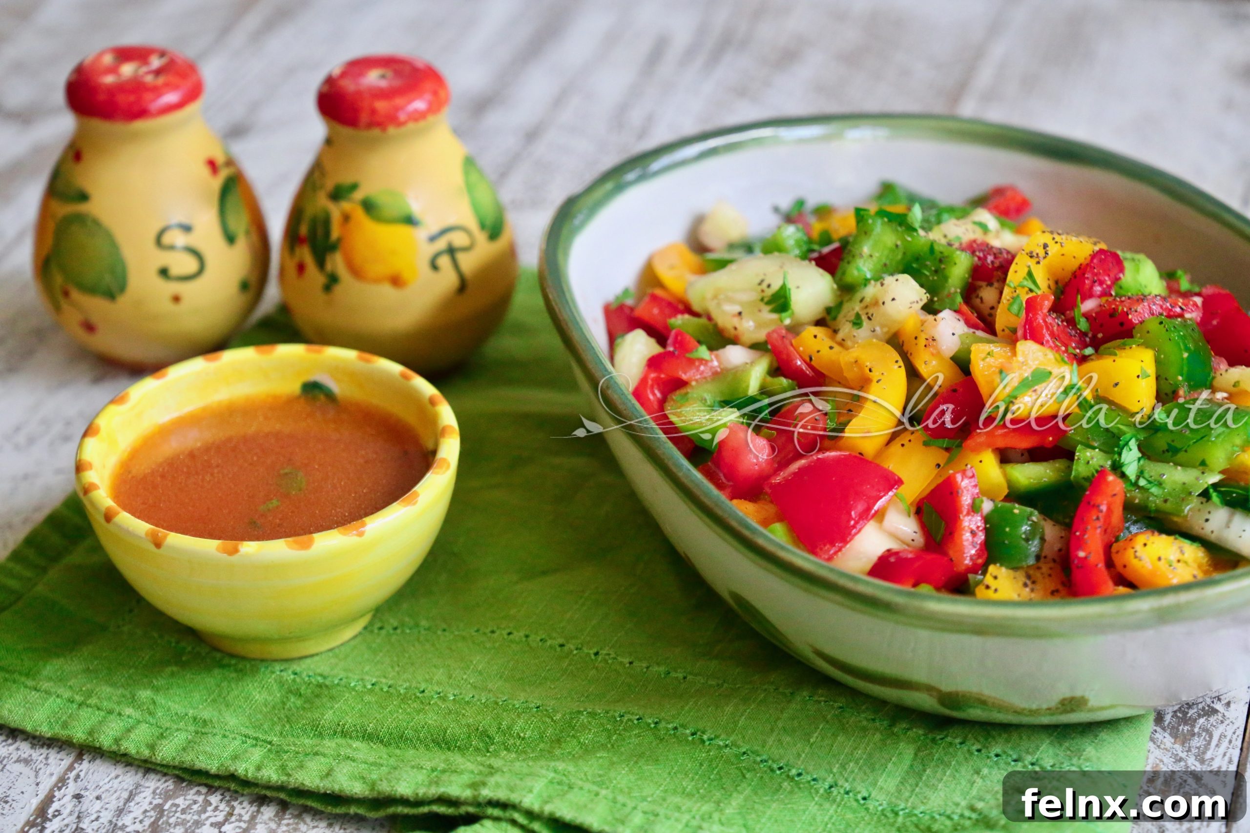 Chopped colorful vegetables on a wooden cutting board