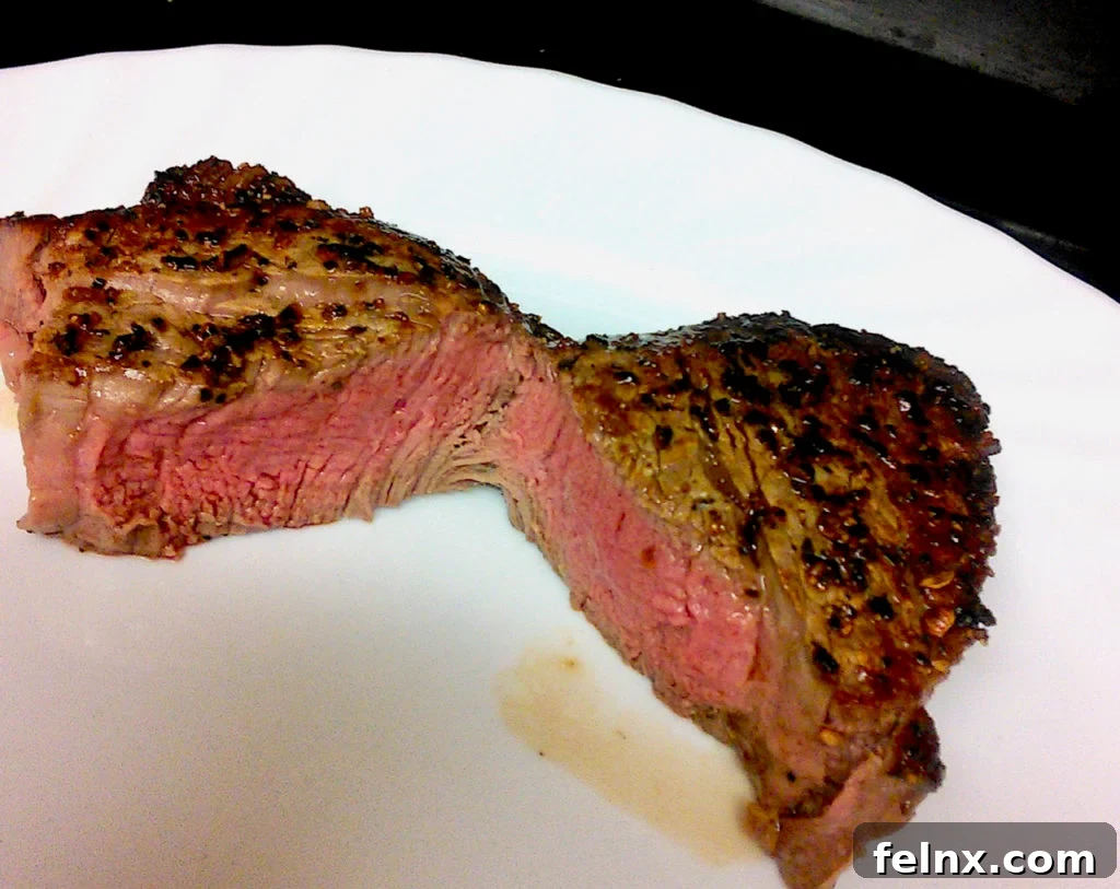 Sliced steak showing perfect pink interior