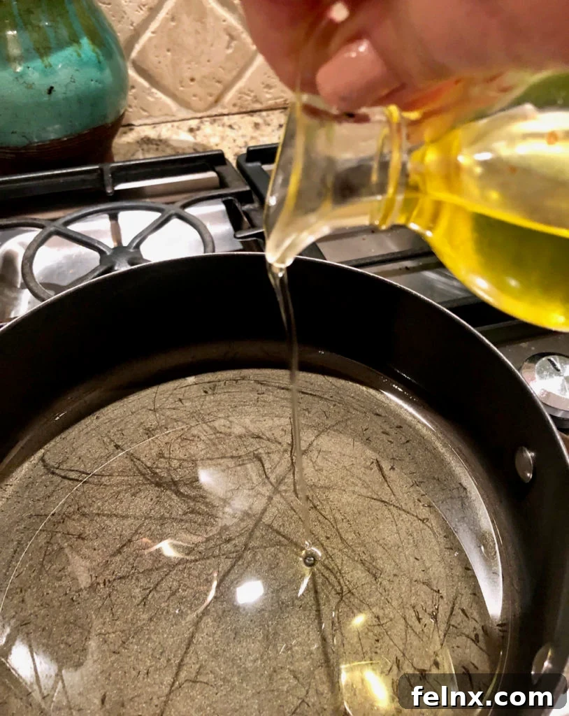 Adding oil to a hot skillet
