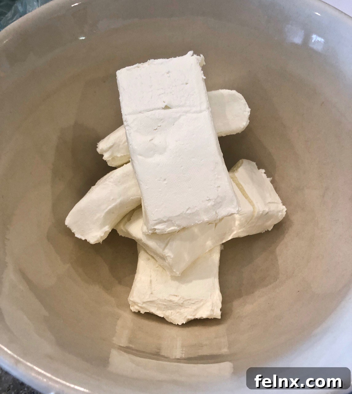 Packages of room temperature cream cheese
