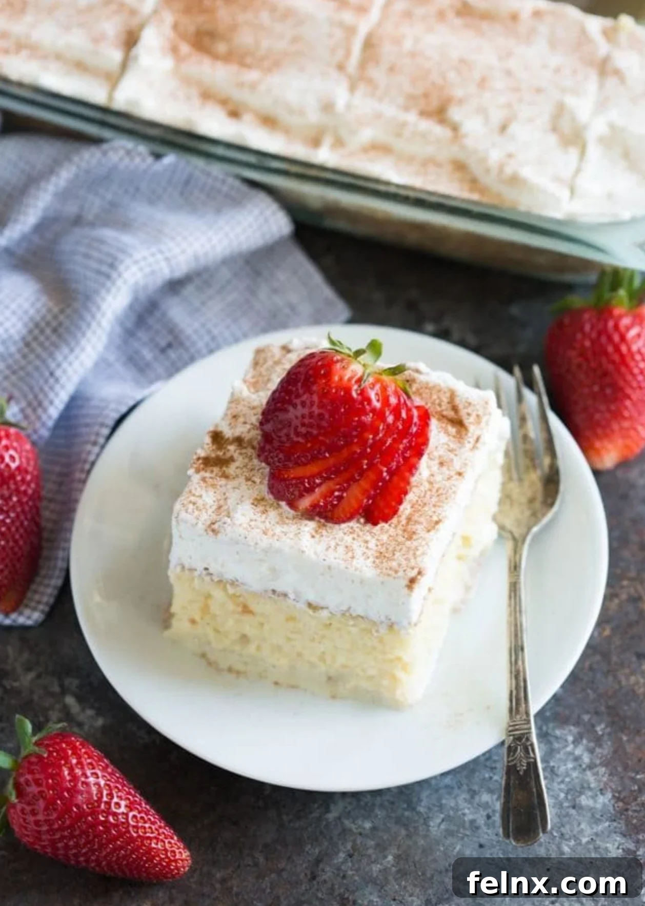 Tres Leches Cake with whipped cream topping