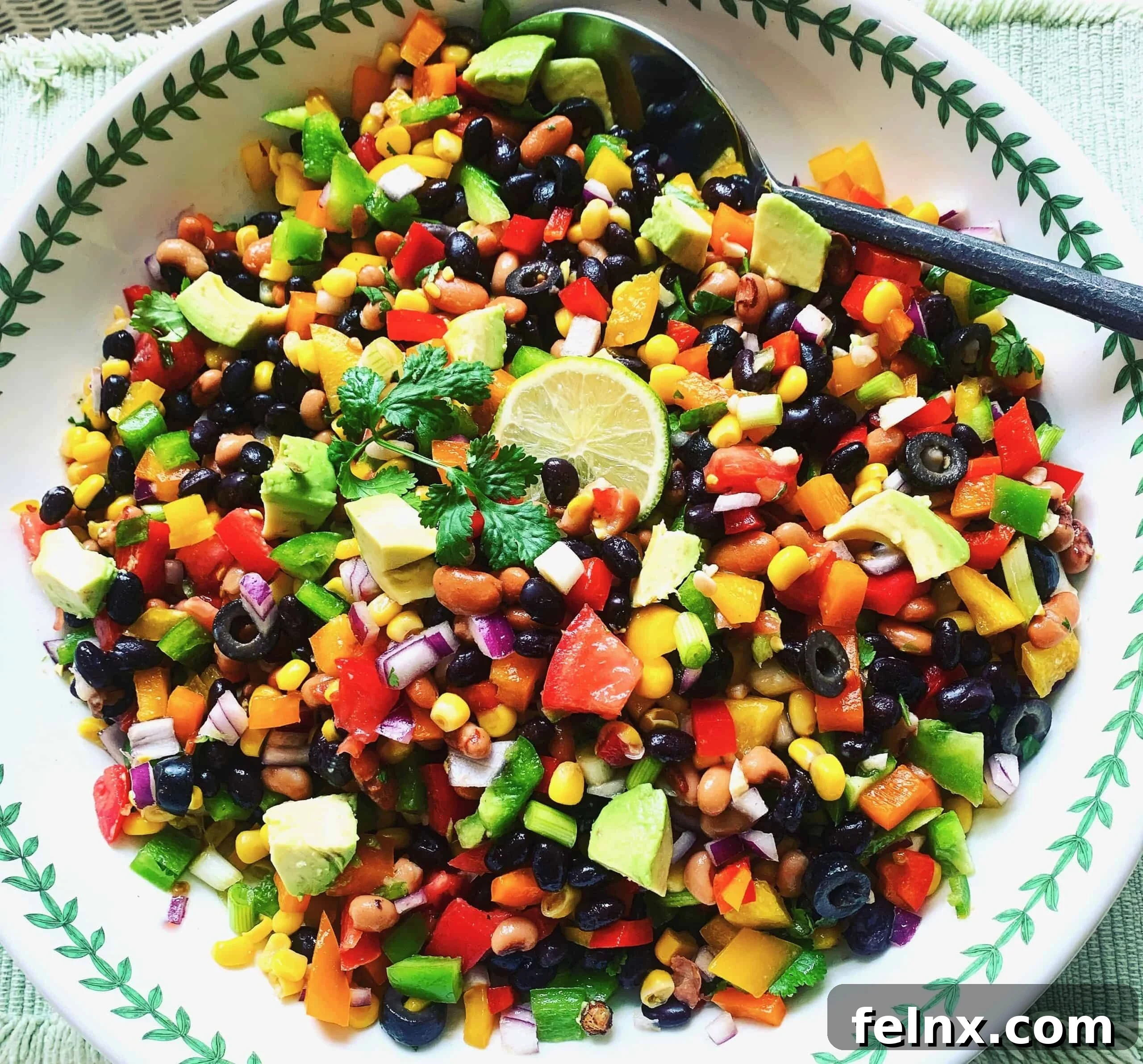 Vibrant and healthy Cowboy Caviar salsa served in a large bowl with tortilla chips