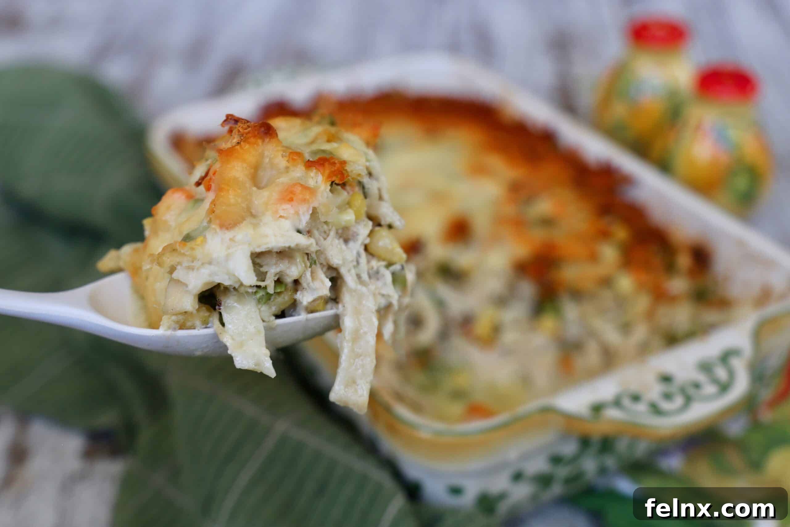 Close up of the thick egg noodles in the casserole