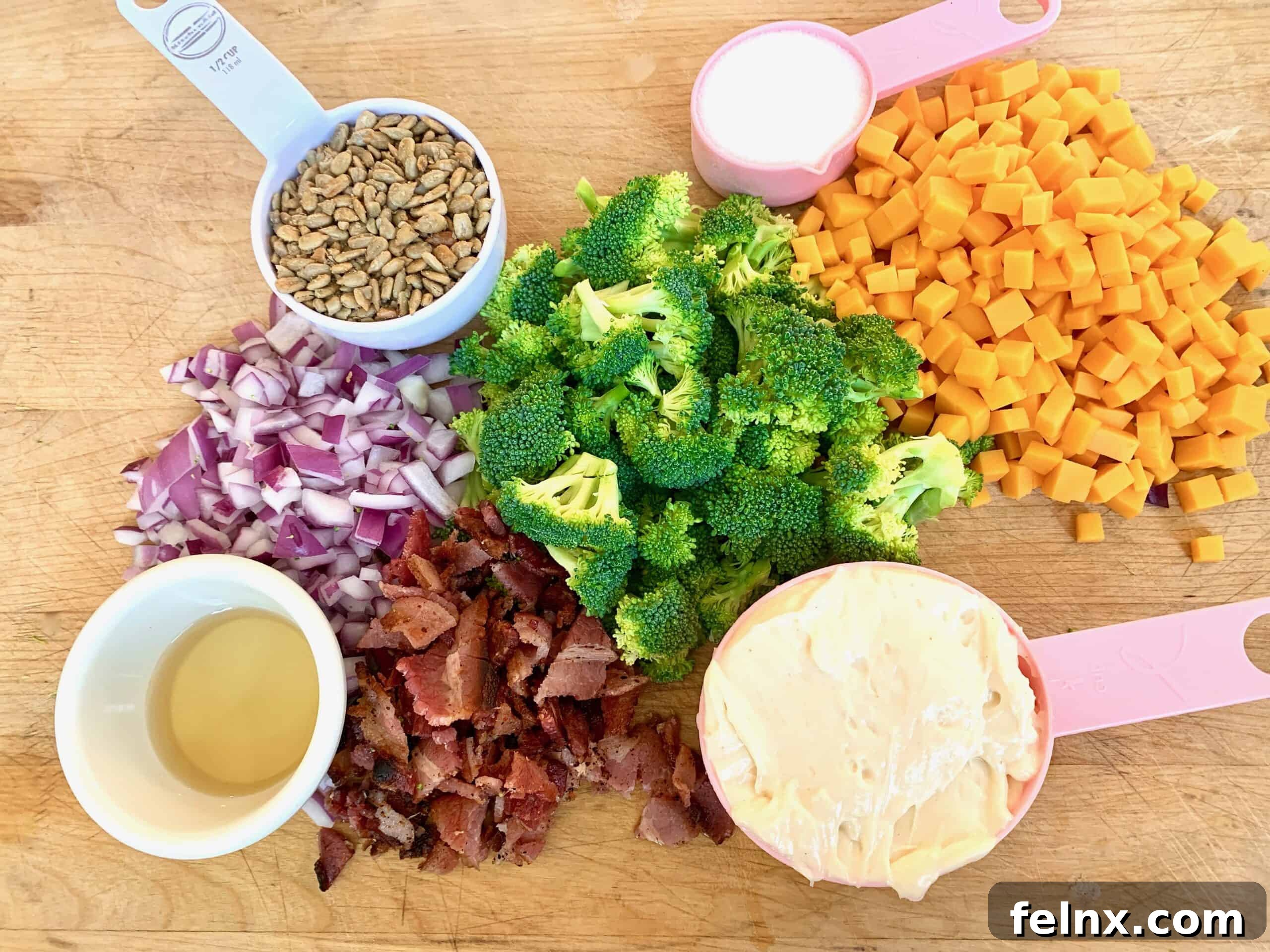 Mixing Fresh Broccoli Salad Ingredients
