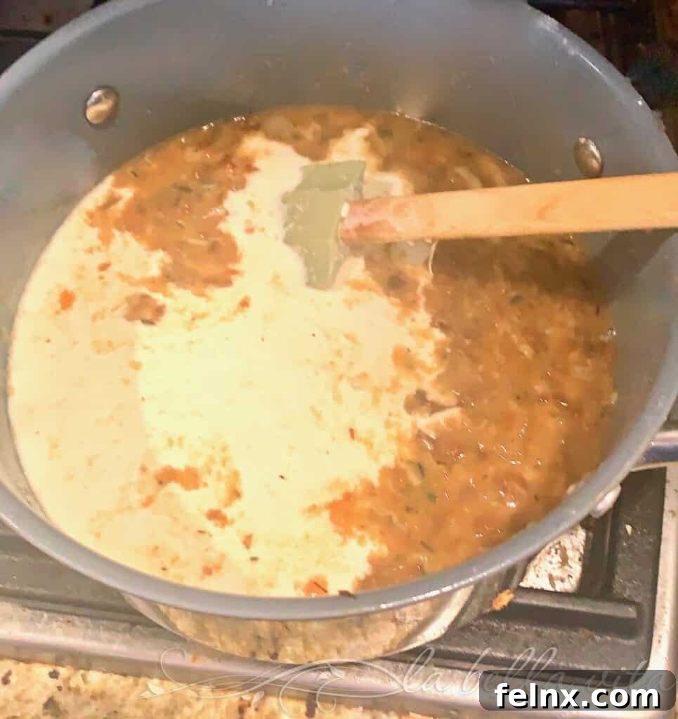 Adding Cream and Parmesan
