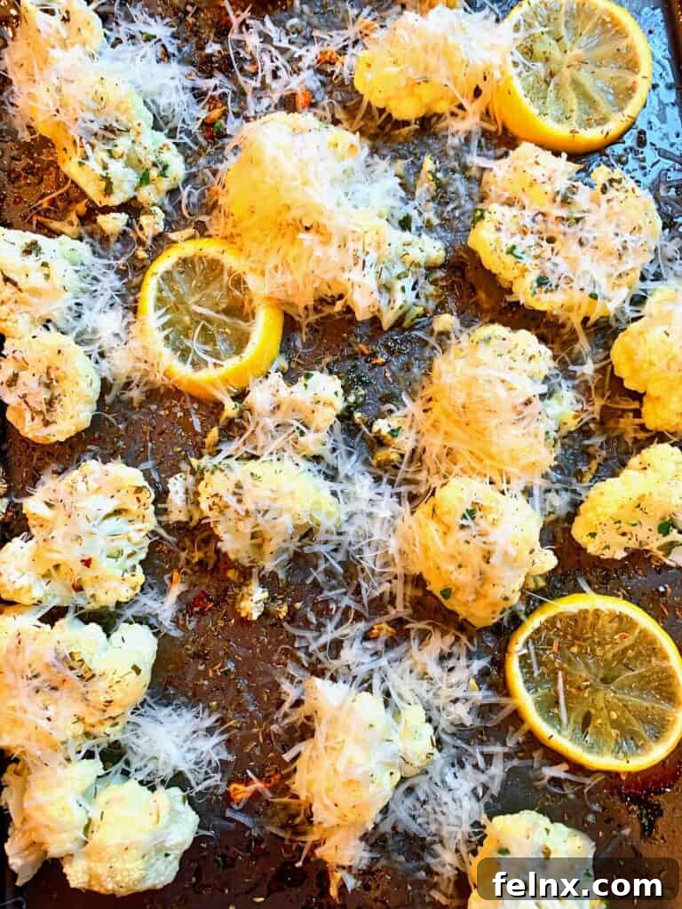 Adding cheese to roasted cauliflower