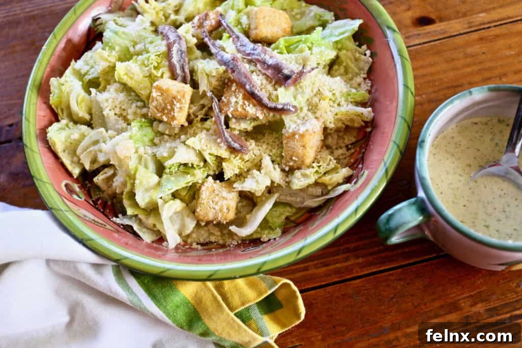 Pouring Caesar Dressing over a salad