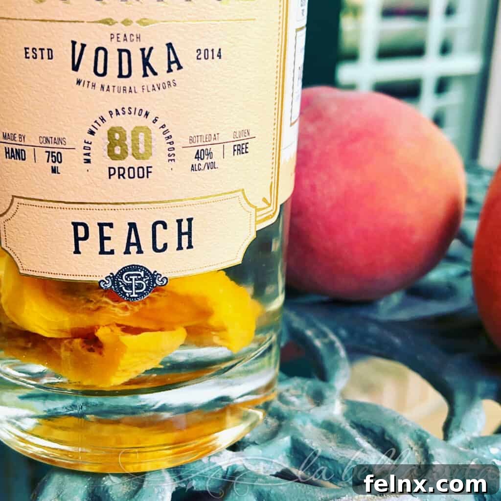 Bottled peach vodka with real peach slices inside