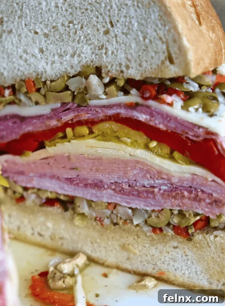 A finished Muffuletta skewer showing various layers