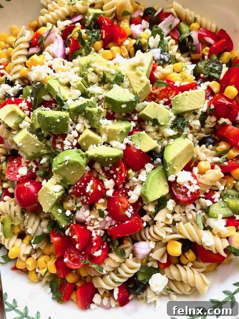 Serving the Mexican Street Corn Pasta Salad