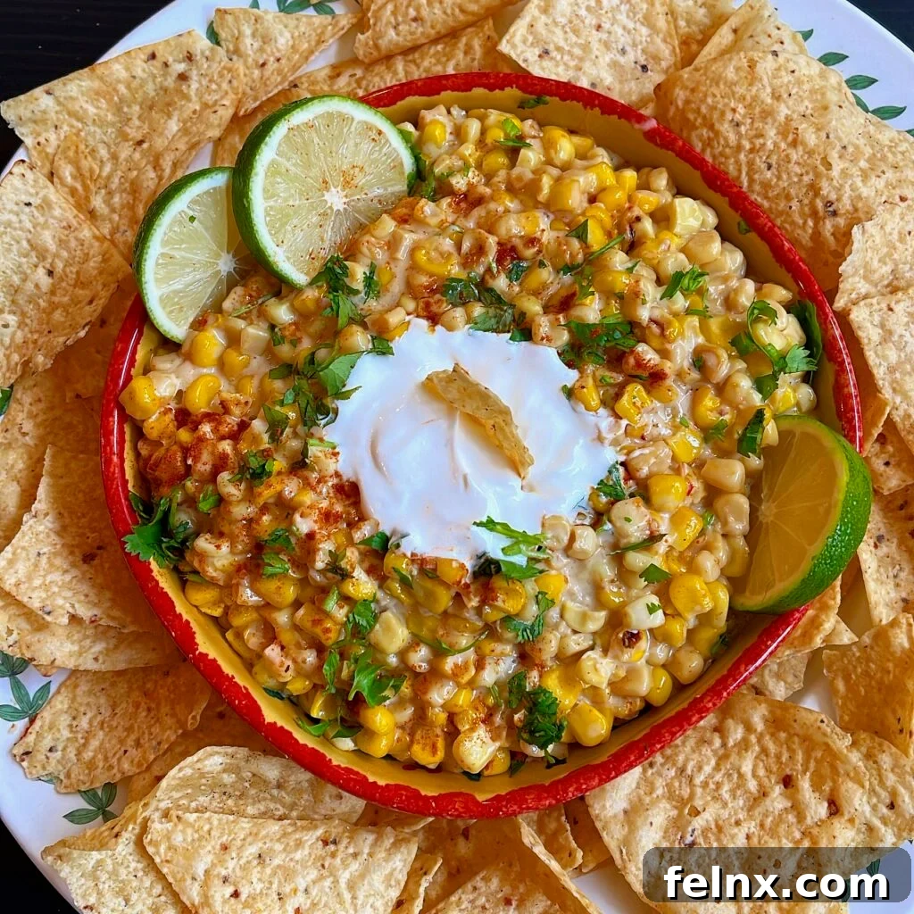 Cheesy Elote Mexican Street Corn Dip on a platter