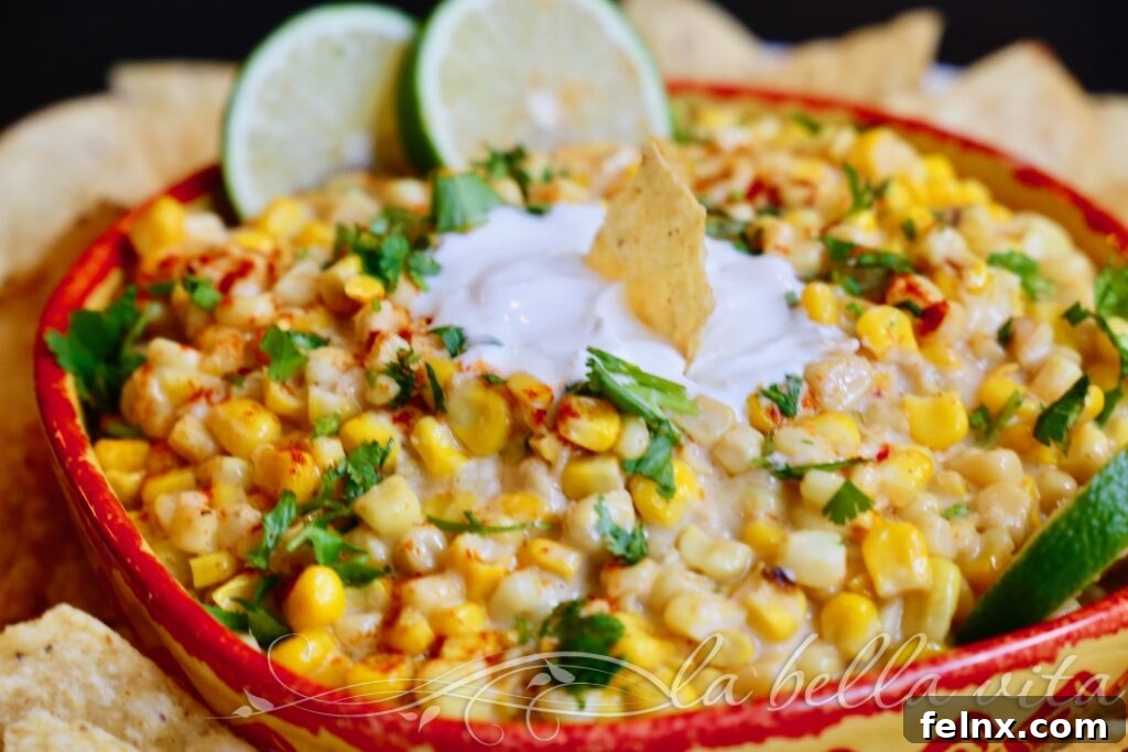 Close up of melted cheese and corn dip