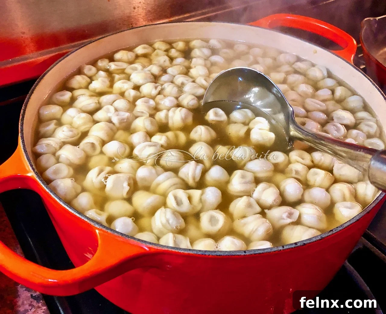 Elegant Tortellini in Brodo served in clear golden broth