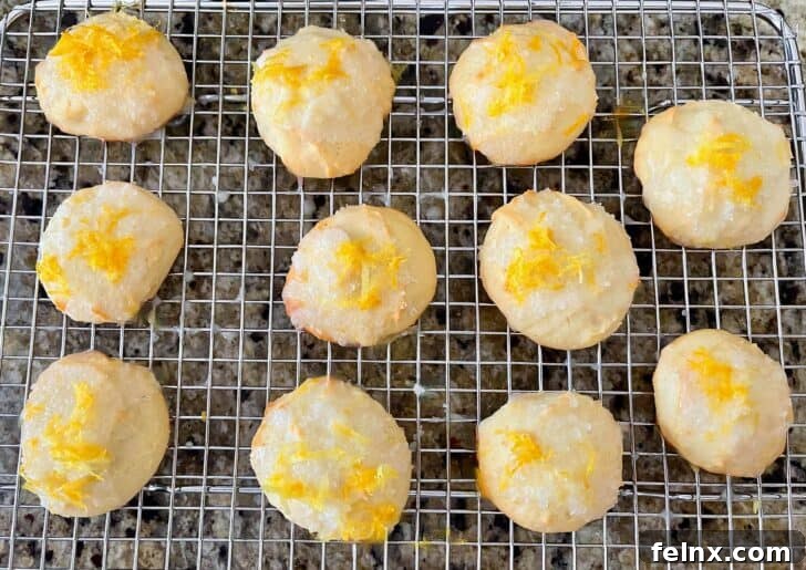 Drizzling glaze over lemon ricotta cookies