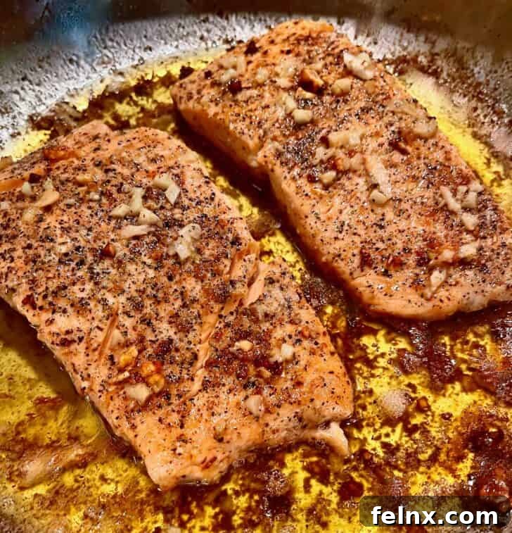 Adding lemon juice to the salmon sauce