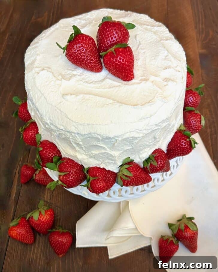 Close up of sliced strawberry cake showing the moist layers