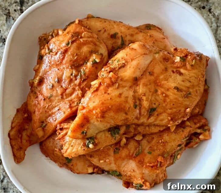 Chicken marinating in a Ziploc bag