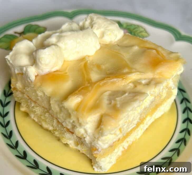 Slicing a piece of Lemon Tiramisu